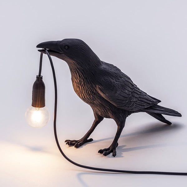White bird lamp viewed from the side