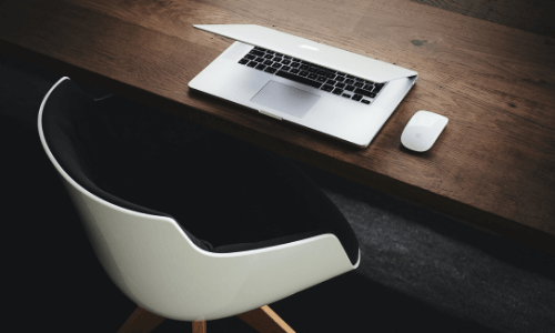 office or school desk with computer and mouse