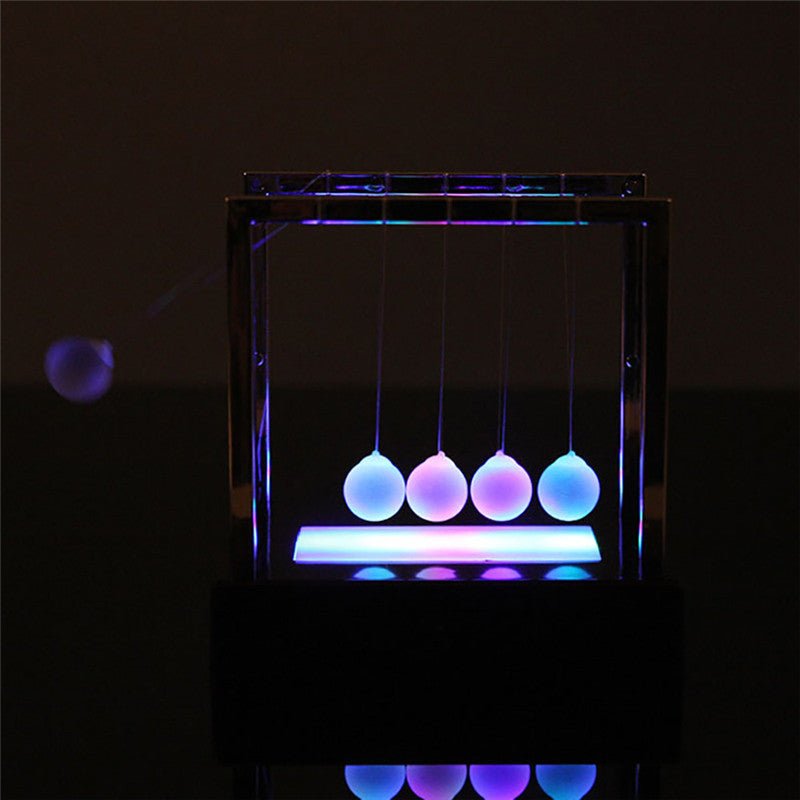 Newton's Glowing Balls Swing - Office Decor Meets ScienceEducational ToysNormanharvey