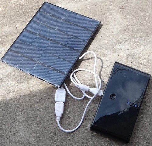 Solar Charger Charge Anywhere, Anytime. For Digital Devices, USB 2.0 Ready.Power Adapters & ChargersNormanharvey